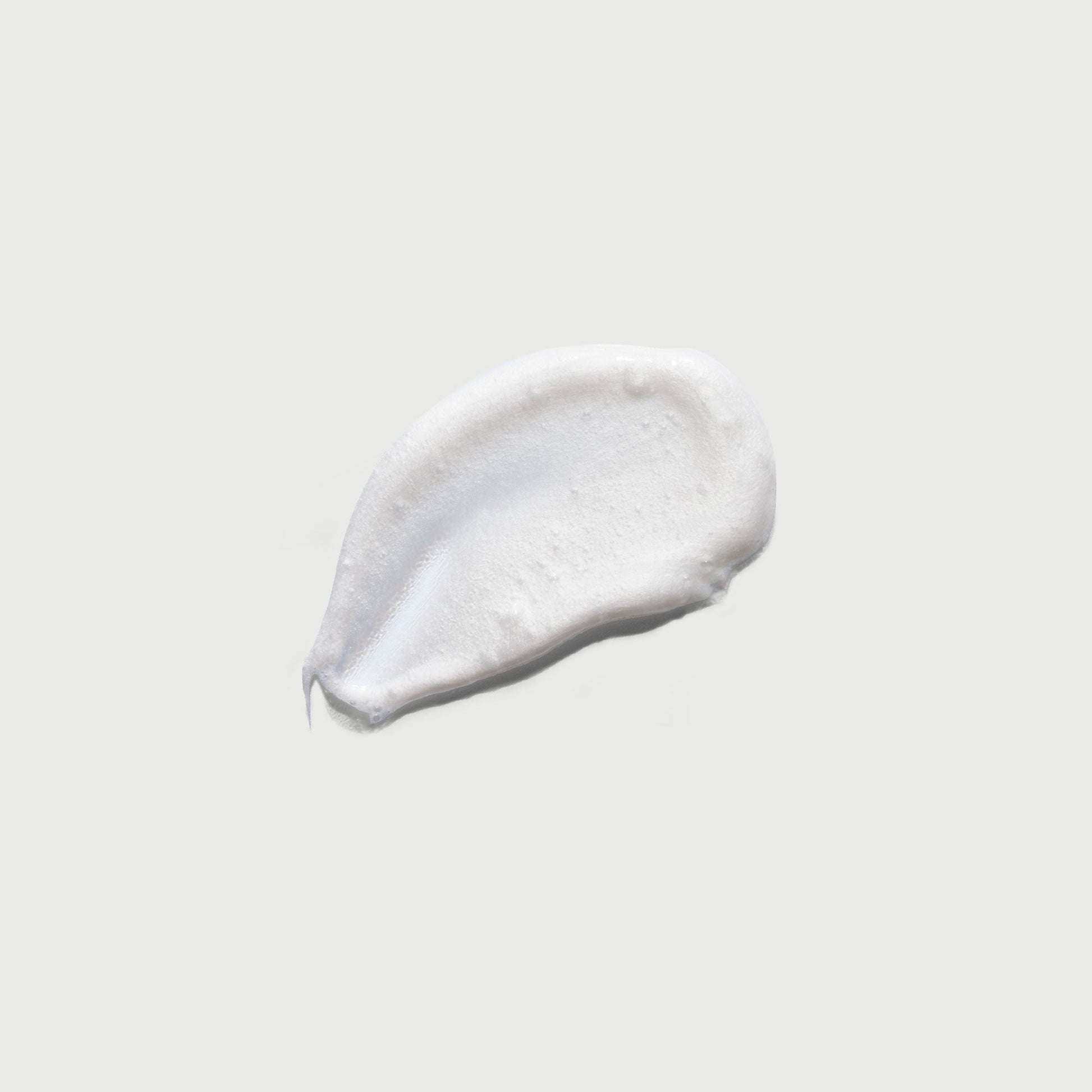 the-smoother-glycolic-acid-exfoliating-body-wash-t8 NATR-40002-Swatch-The-Smoother-Glycolic-Acid-Exfoliating-Body-Wash-bonebkgd.jpg