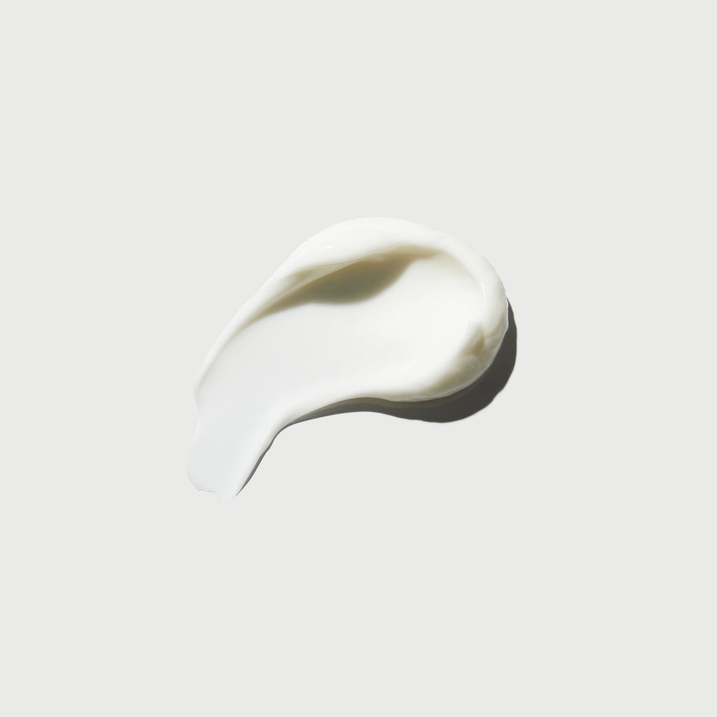 the-smoother-glycolic-acid-body-lotion-i6 NATR-40014-Swatch-The-Smoother-Glycolic-Acid-Body-Lotion-bonebkgd.jpg