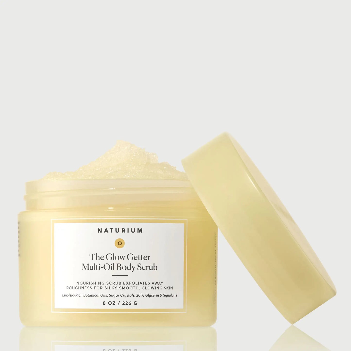 the-glow-getter-multi-oil-body-scrub-h4 NATR-40028-GlowGetter-Multi-Oil-Body-Scrub-Front-CapOff-bonebkgd.webp